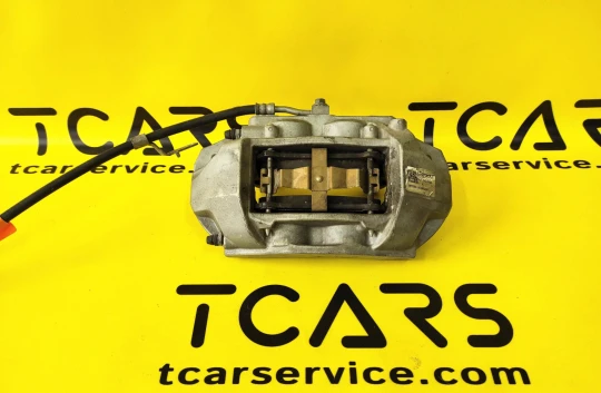 Tesla Model 3 2017-2023 Front Left Brake Caliper BASE with Brake Pads OEM (used) 1044621-00-E