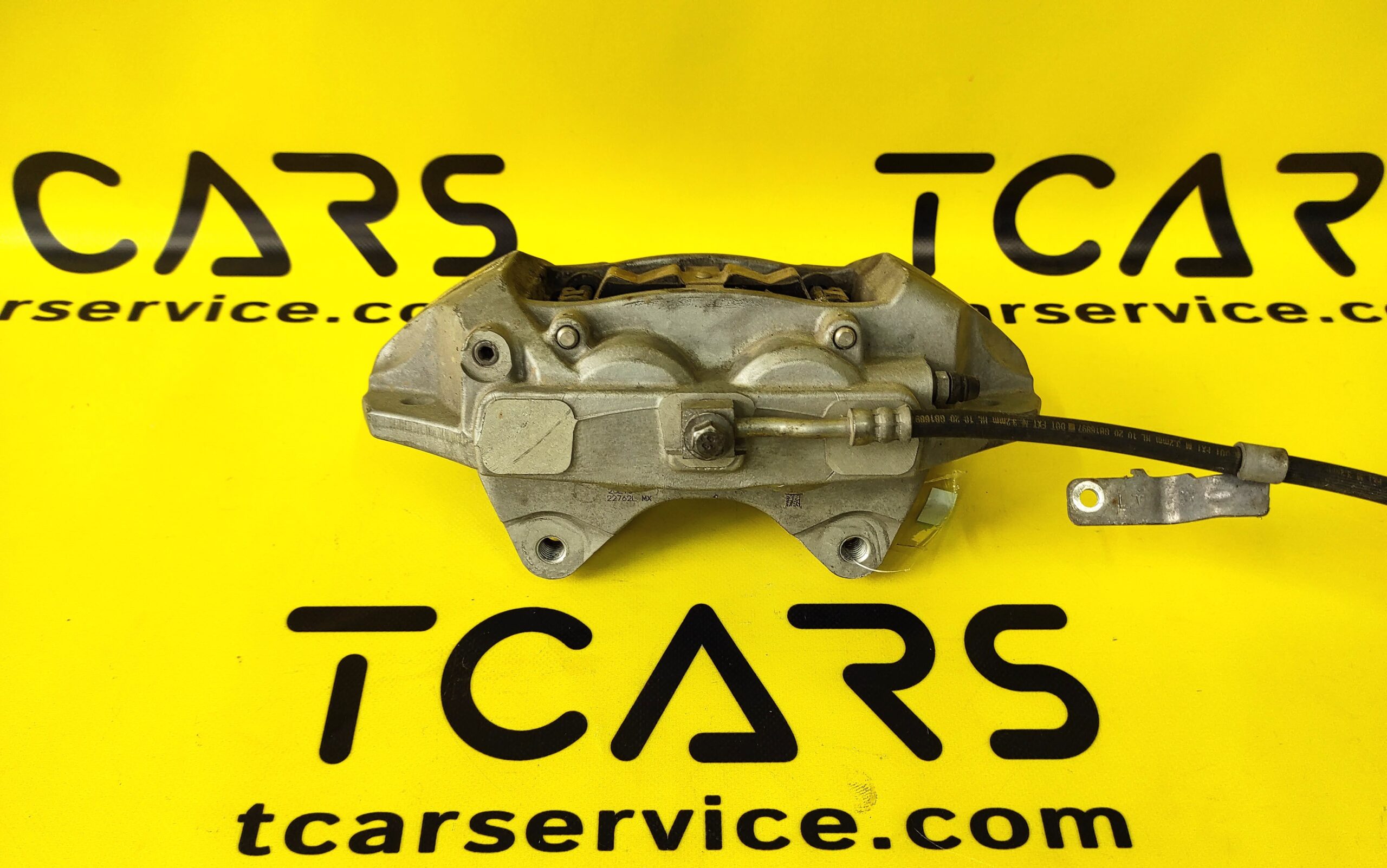 Tesla Model 3 2017-2023 Front Left Brake Caliper BASE with Brake Pads OEM (used) 1044621-00-E  Photo №3